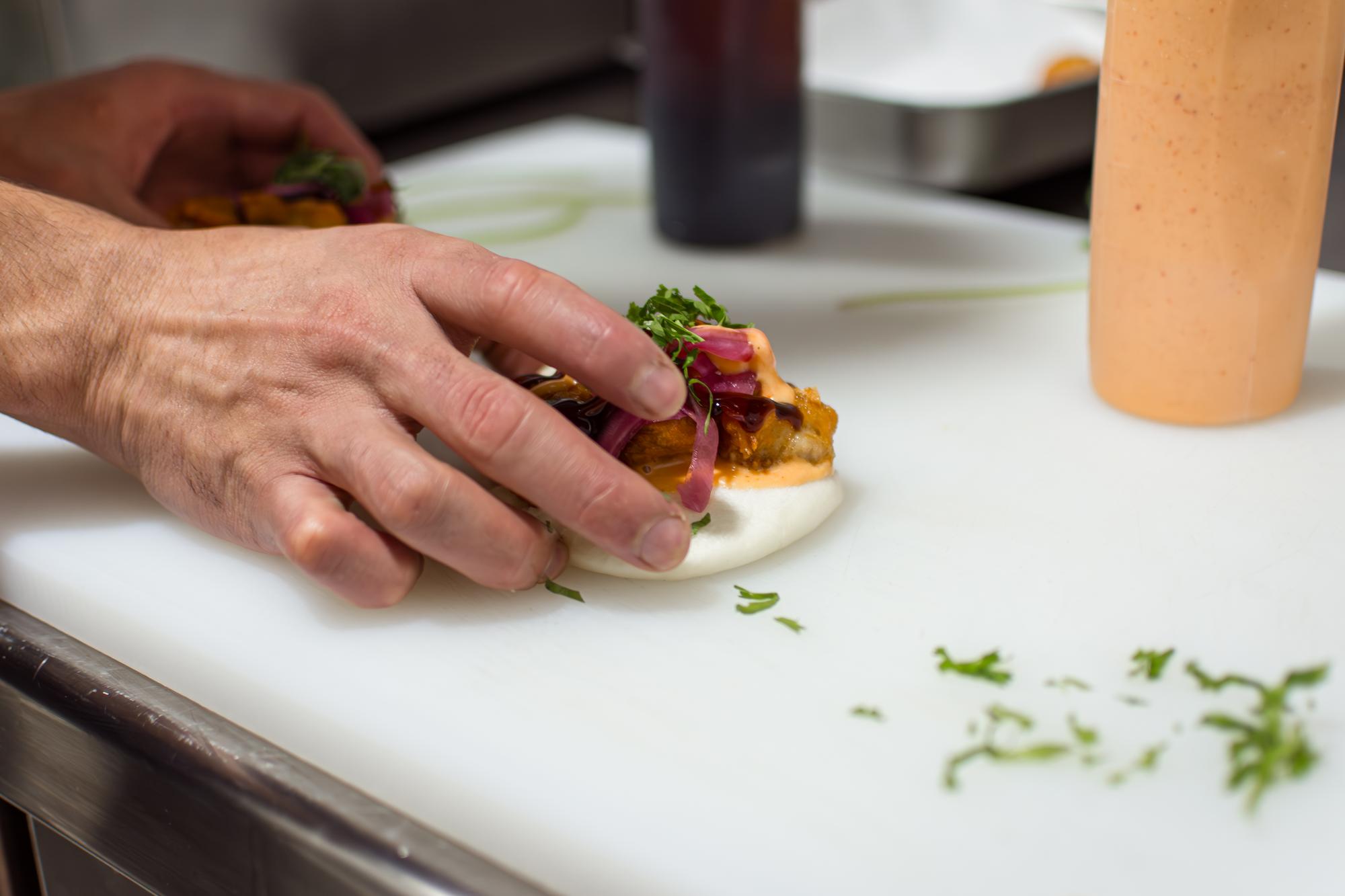 chef preparing a tasting plate